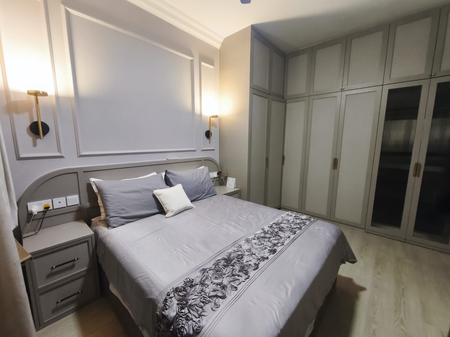 Primary bedroom with built-in wardrobes